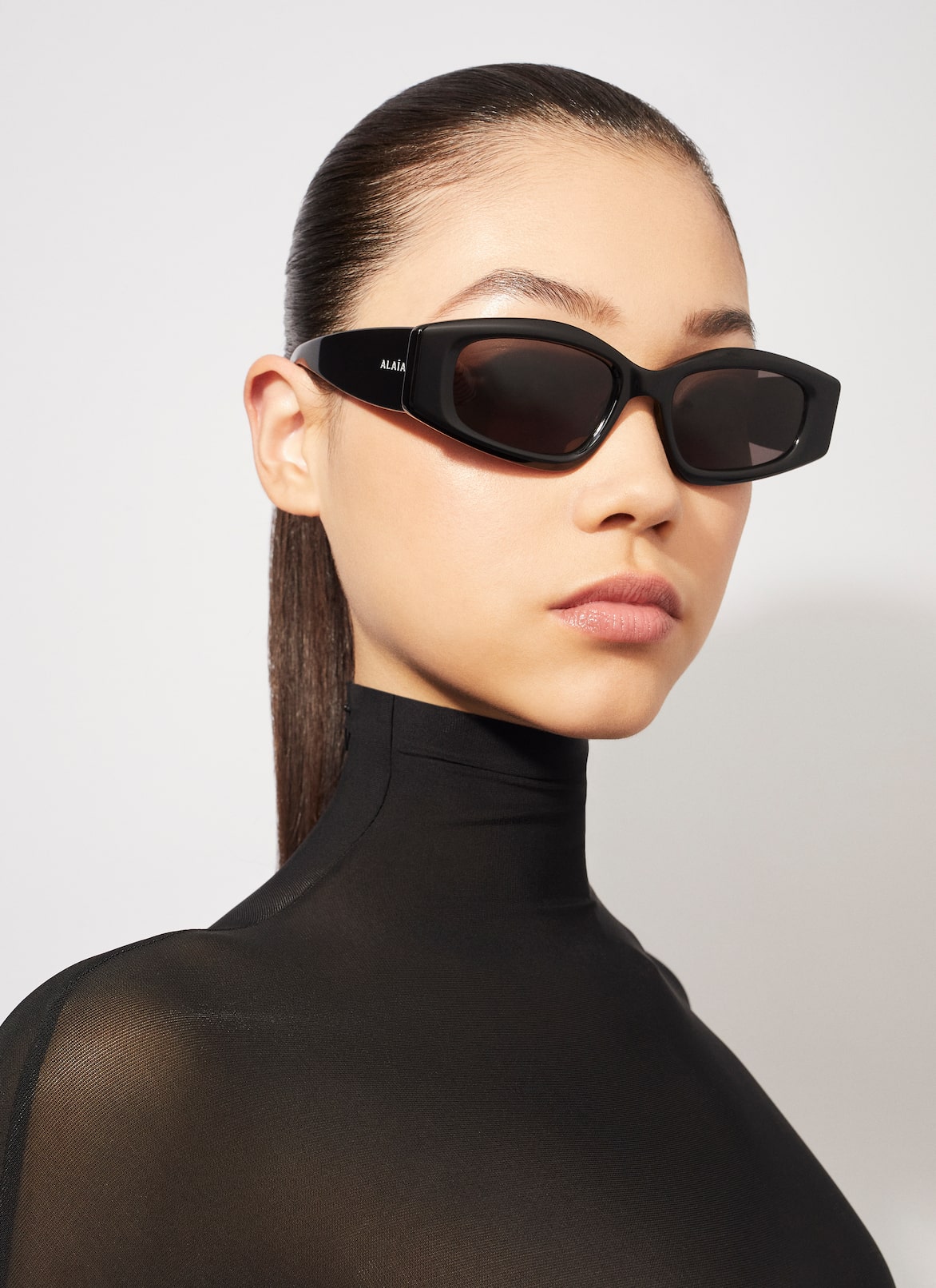 OVAL SUNGLASSES ALAÏA BLACK OVAL SUNGLASSES